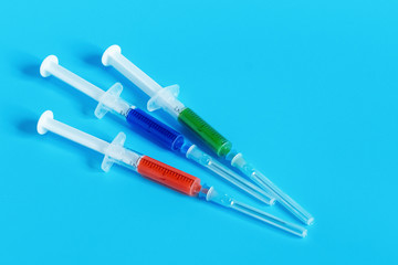 Vaccine and syringe for injection. Prevention, immunization and treatment of coronavirus infection, influenza, virus and bacteria. Medicine infectious concept..