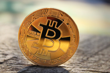 Cryptocurrency - digital currency, bitcoin. Cryptocurrency coin - Bitcoin Macro Shot. Photo Illustration of bitcoin coin to illustrate blockchain and cyber currency.