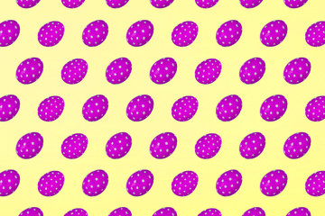 Pink Easter eggs on a yellow background. Festive preparation, pattern, repetition, banner.