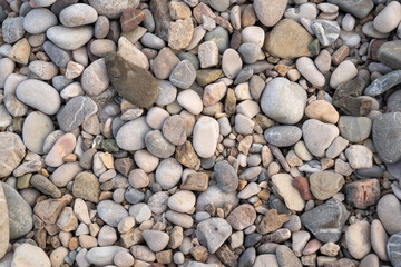 Abstract background texture with a lot of round peeble stones