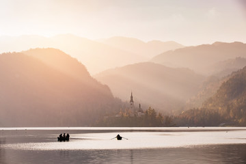 Afternoon lights at Bled Lake, Slovenia, Europe. St. Martin church in the background. - 331717102