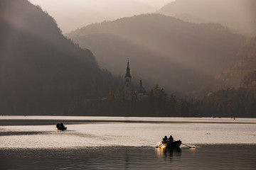 Afternoon lights at Bled Lake, Slovenia, Europe. St. Martin church in the background. - 331717339