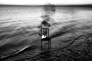 Fototapeta na wymiar chair on the beach at sea