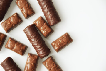 chocolate candies on a white background.