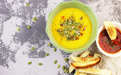 yellow soup in a green plate