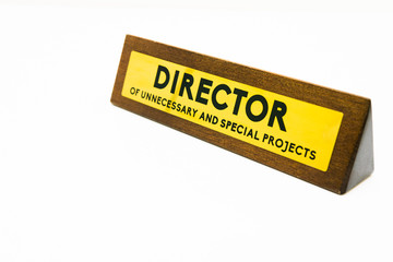 Wooden yellow business office plate in whitebackground with title 