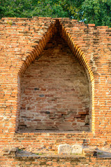 Old vintage brick wall in Lopburi, Thailand. Weathered brick wall texture background at old temple.