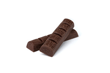 Dark chocolate bar with peanut isolated on white.