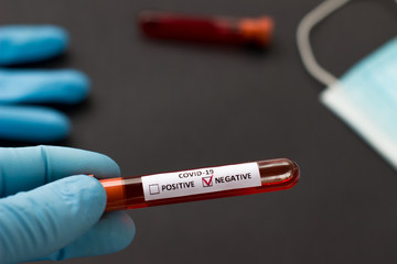 blood test tube to examine the corona virus