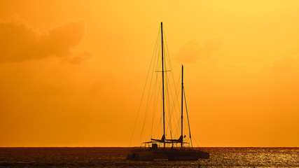 Yachts in the Bay. Silhouettes of yachts at sunset.