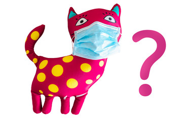 Baby toy - plush cat in a face mask as a symbol of a global flu pandemic
