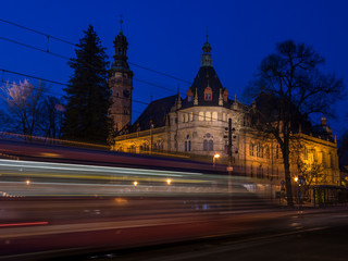 Fototapeta na wymiar North Czech museum Art Nouveau in Liberec. Evening scene with lights by passed tram.