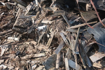  public trash dumped in a public place on gray earth
