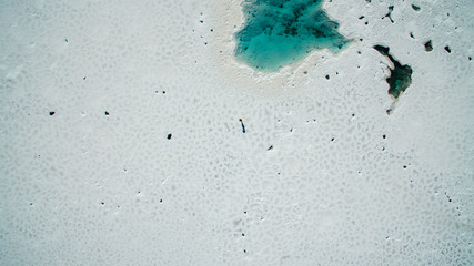 Aerial view. Cenital. Salt water pool on the Salinas Grandes salt flats in Jujuy province, northern Argentina.