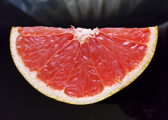 close up image of a grapefruit slice