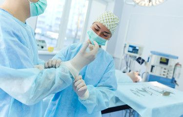 Man surgeon at work in operating room