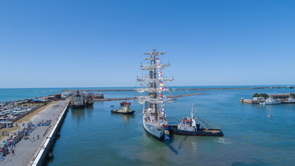 Naklejka premium Aerial plan of freedom frigate arriving in port. Buenos Aires - Argentima.