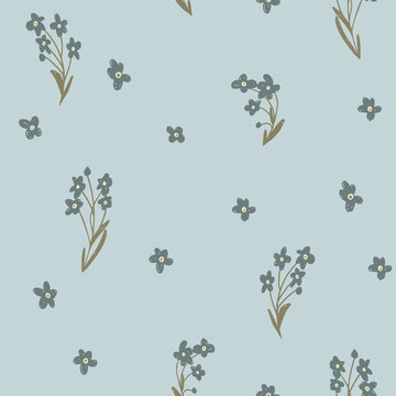 Forget-Me-Not vector seamless pattern.  Cute and tender wild flowers on light blue background for wrapping paper, fabric, textile, wallpaper, home decor