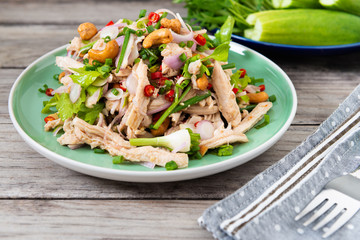 Steamed rip chicken spicy salad with shallot, celery, chili and Scallion.