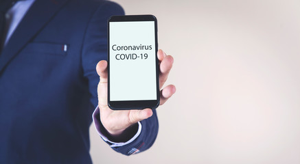 man hand coronavirus text