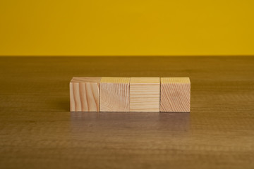 Wooden blocks and cubes ready for adding text and word that can be used to convey a message or a concept