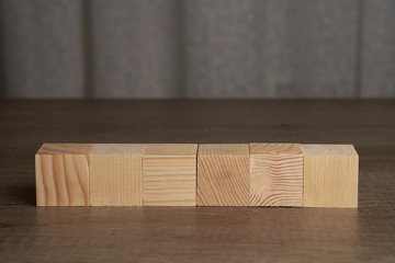 Wooden blocks and cubes ready for adding text and word that can be used to convey a message or a concept