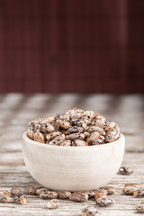 Castor oil seeds on the table, space for text