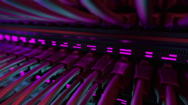 Close-up View of Modern Internet Network Switch With Plugged Ethernet Cables. Blinking Lights on Internet Server. Concept of Data Center, Cloud Computing and Telecommunications. Endless Loop.