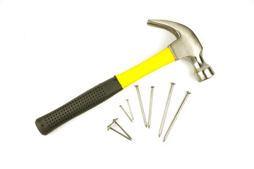 Hammer and nails of various sizes Isolated on white background.