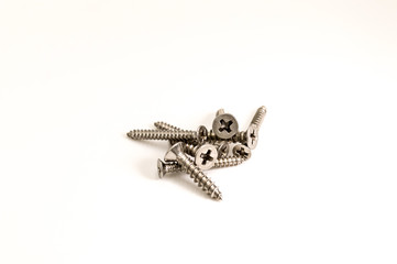 Pile of metal Phillips screws