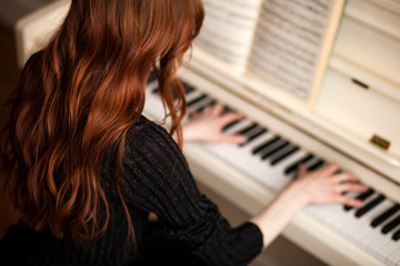 woman playing piano