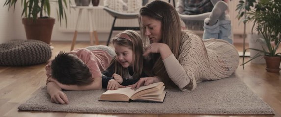 Mother daughter son reading stay home social distancing containment self isolate quarantine coronavirus - Powered by Adobe