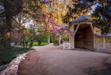  Wooden house on a path in the El Capricho park