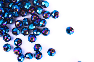 close up multi colored beads heap isolated on white