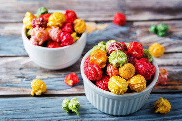 Multicolor caramel sweet Popcorn in a white bowl