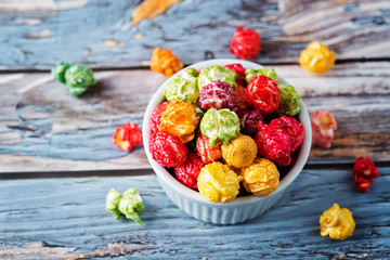 Multicolor caramel sweet Popcorn in a white bowl