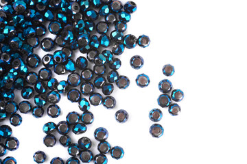 close up multi colored beads heap isolated on white