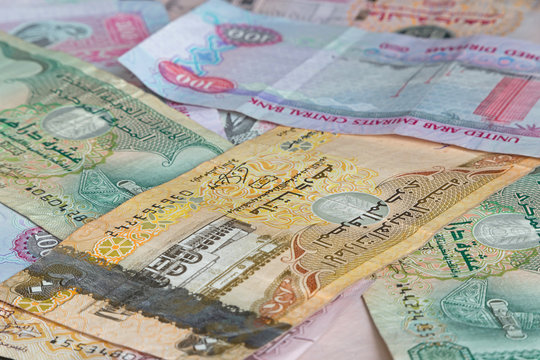 currency of United arab Emirates: heap of dirhams banknotes
