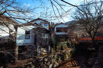 Fototapeta premium Miyajima, Japan - January 02, 2020: Cityscape to the Walking Tourists and Itsukushima streets