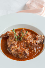 Lamb stew with aromatic herbs seen from above