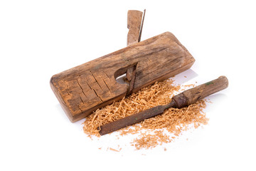 Vintage rusty plane and chisel on a white