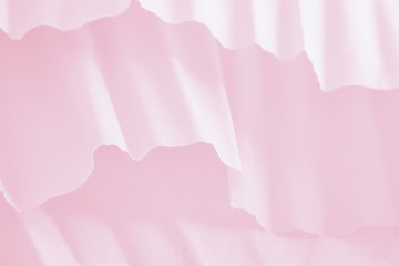 Pale pink gradient background with paper waves