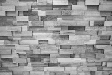 Beautiful wooden blocks wall with texture and rough surface in black and white tone for background and decoration. 