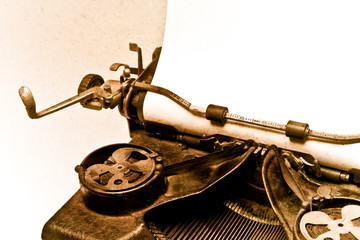 Antique type writer with paper