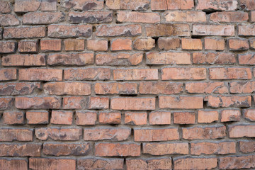 Fototapeta premium The texture of the red brick walls. Brickwork of non-residential buildings.