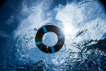 Underwater view of life preserver floating.