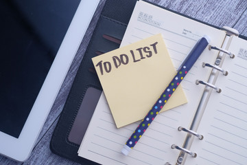 top view of to do list on notepad at offie table.