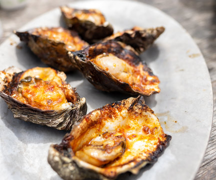 6 Grilled and Sauced Oysters