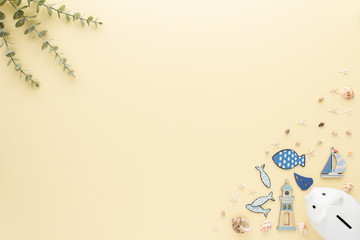 Holidays Travel. Sail boat lighthouse shell summer background with copy space for your text. Flat lay, top view.