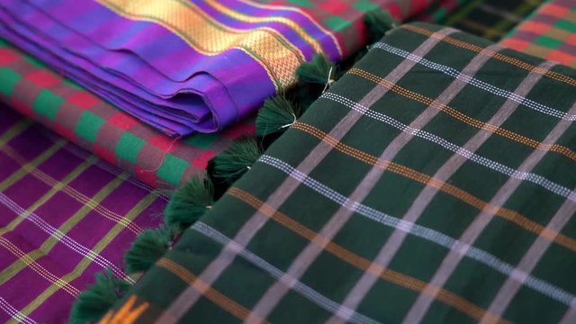 Multicolored Ilkal sarees with different checkered pattern designs. Ilkal sari is a traditional handloom sari from the town of Ilkal in Bagalkot district, Karnataka